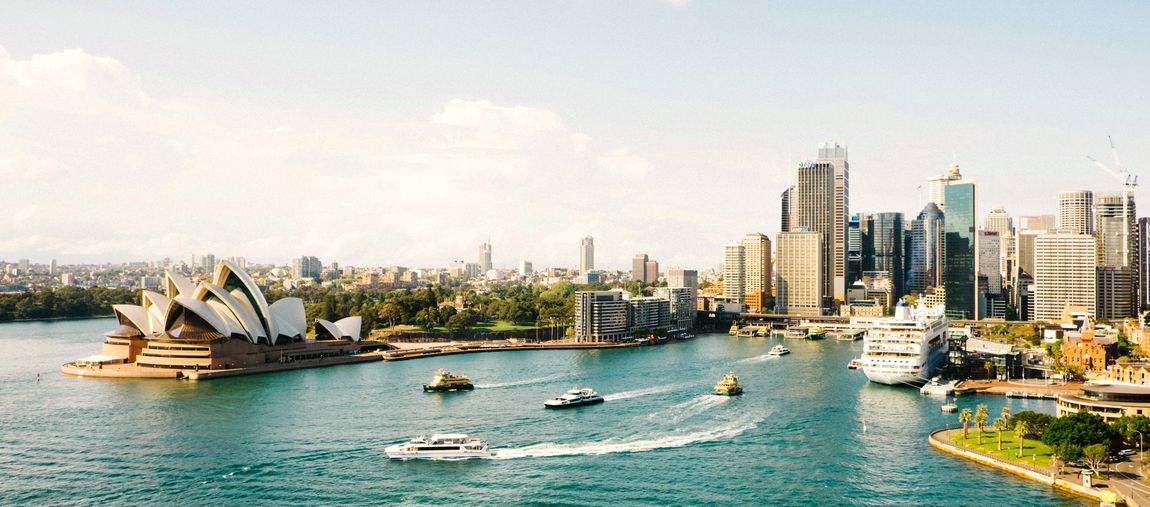 Student in front of the Sydney Opera House, Australia