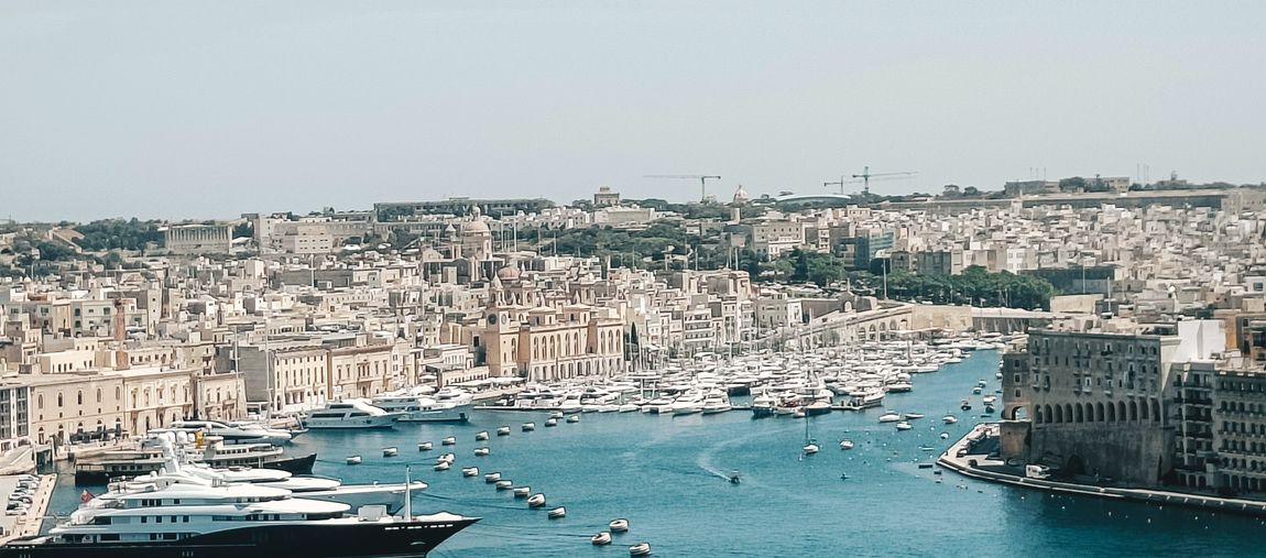 Student overlooking Valletta harbour, Malta