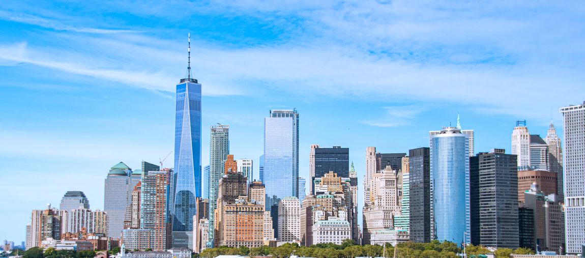 Student overlooking the New York City skyline, United States